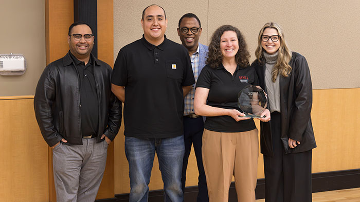 OneIT Team Player Awardee Yvonne Tempel with OneIT Awards Committee members Ed Legaspi, Kevin Perez, Kirk Campbell, and Tayor Jaress