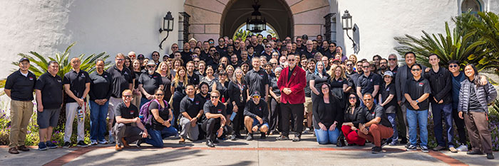 Group photo of OneIT personnel in front of Hepner Hall