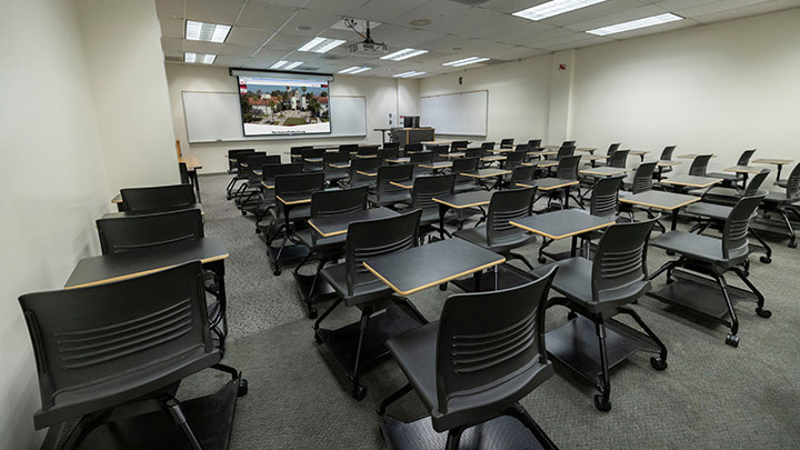 Adams Humanities 3110 view from back showing the podium and projection screen