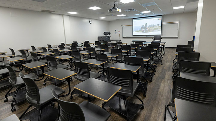 Adams Humanities 3113 view from back showing the podium and projection screen