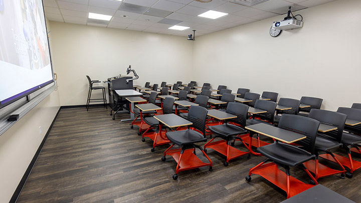 Adams Humanities 3130 view from front showing the podium and projector