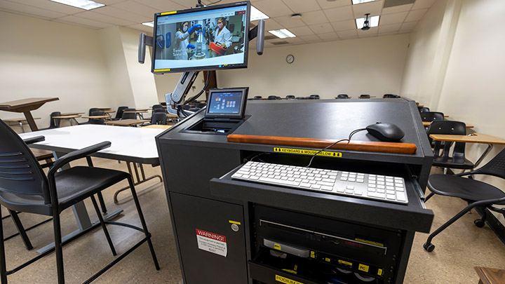 Adams Humanities 3177's instructor podium with integrated tech