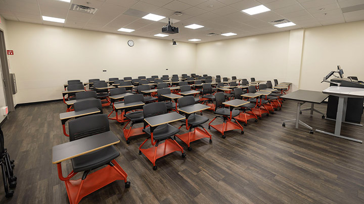 View from front of classroom showing the podium and projector