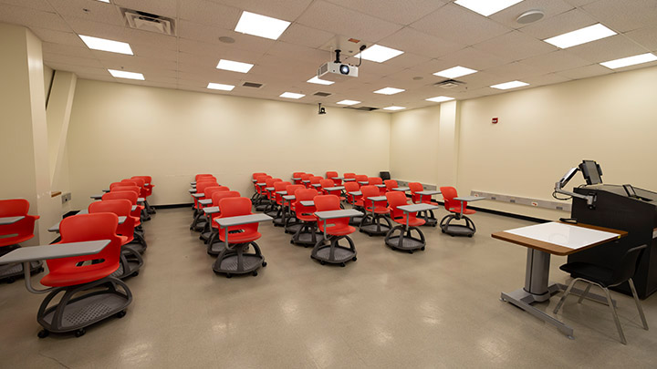 Front of classroom showing the podium and projector