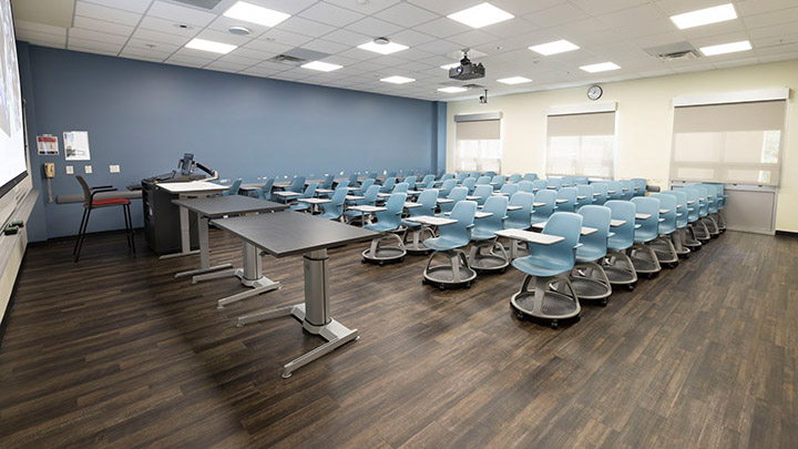 Front of classroom showing the podium and projector