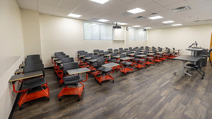 Front of classroom showing the podium and projector