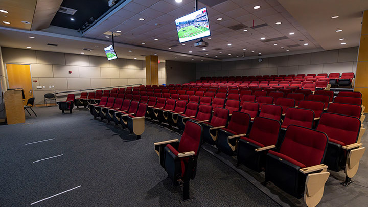 Front of classroom showing the podium and projector