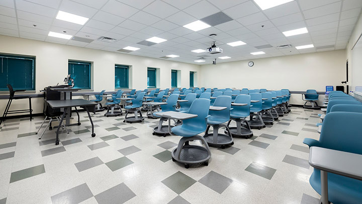 Front of classroom showing the podium and projector