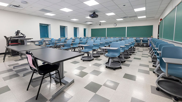 Front of classroom showing the podium and projector