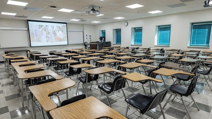 Classroom with podium and projection screen