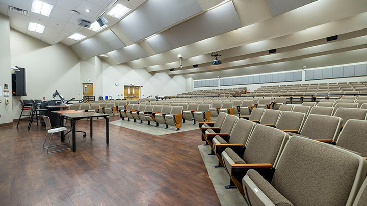 Front of classroom showing the podium and projector