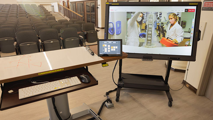 Connected classroom technolgy, computer, large screen and control panel