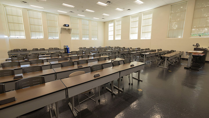 Front of classroom showing the podium and projector