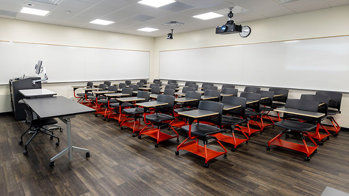 Front of classroom showing the podium and projector