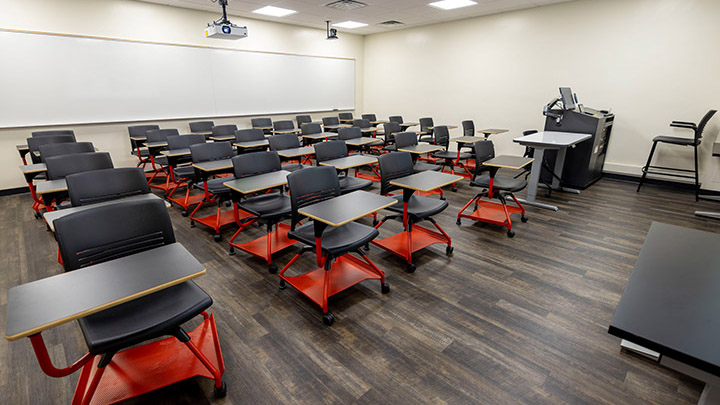 Front of classroom showing the podium and projector