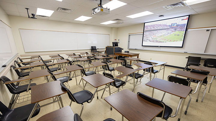 Classroom with podium and projection screen