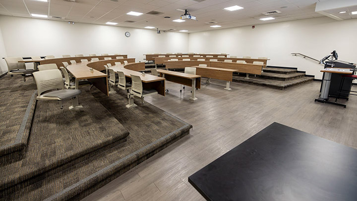 Front of classroom showing the podium and projector