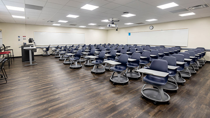 Front of classroom showing the podium and projector