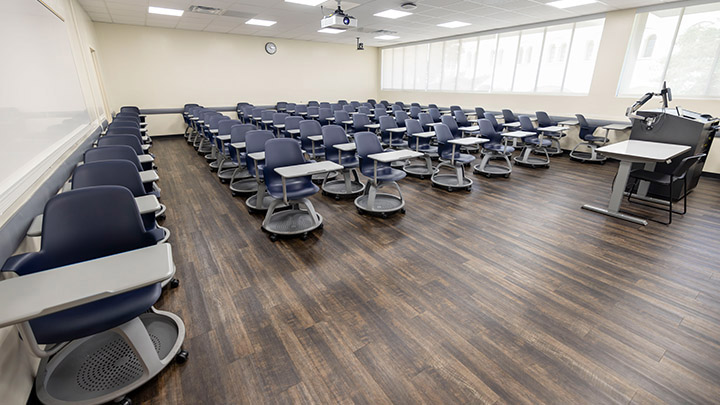 Front of classroom showing the podium and projector