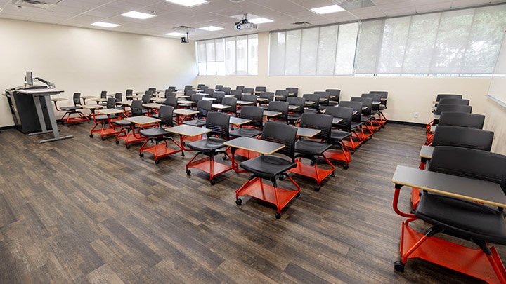 Front of classroom showing the podium and projector