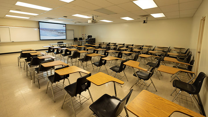 Classroom with podium and projection screen