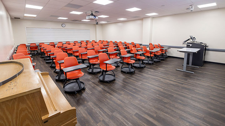 Front of classroom showing the podium and projector