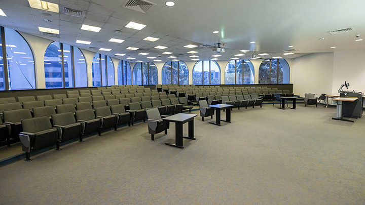 Front of classroom showing the podium and projector