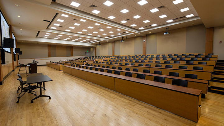 Front of classroom showing the podium and projector