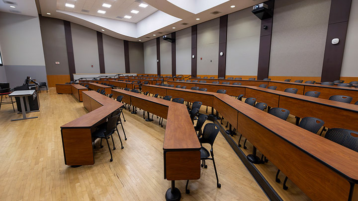 Front of classroom showing the podium and projector