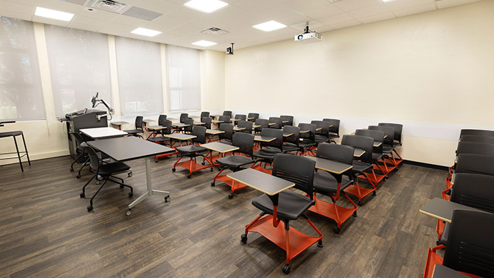 Front of classroom showing the podium and projector