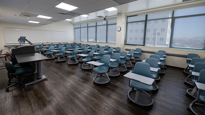 Front of classroom showing the podium and projector