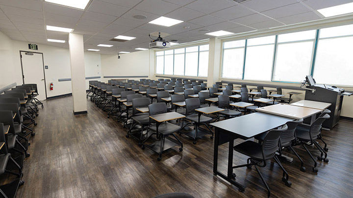 Front of classroom showing the podium and projector