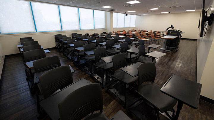 Front of classroom showing the podium and projector