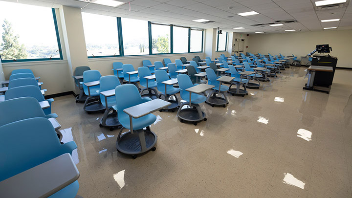 Front of classroom showing the podium and projector
