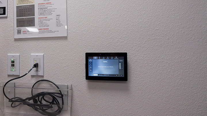 Classroom technology control panel on wall