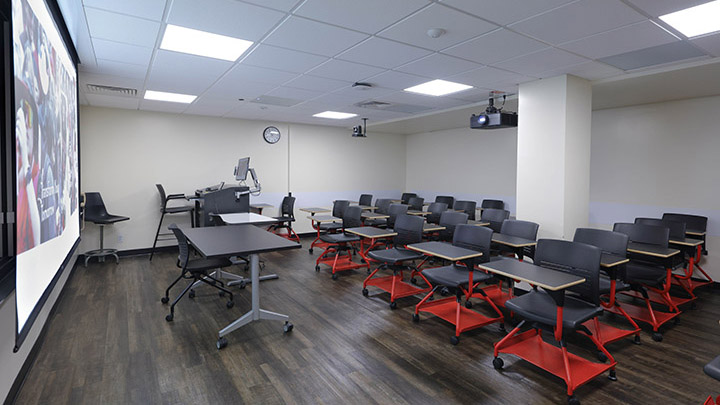 Front of classroom showing the podium and projector