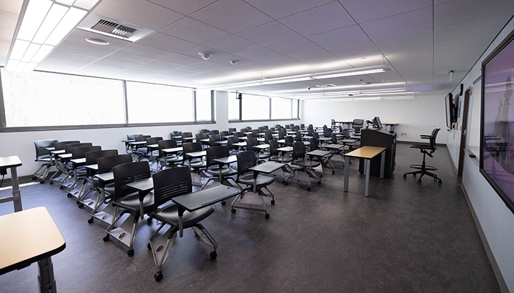 Front of classroom showing the podium and projector