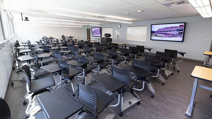 Classroom with podium and screen in front