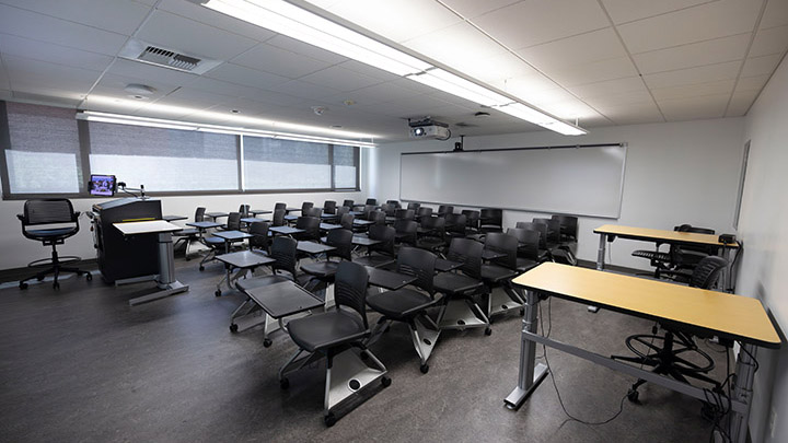 Front of classroom showing the podium and projector