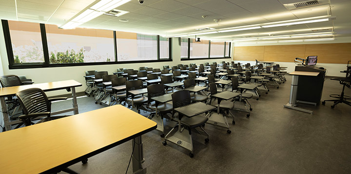 Front of classroom showing the podium and projector