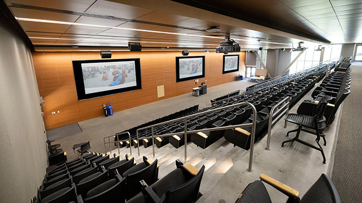 Classroom with podium and projection screens