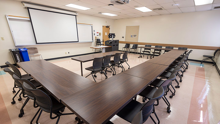 Classroom with podium and projection screen