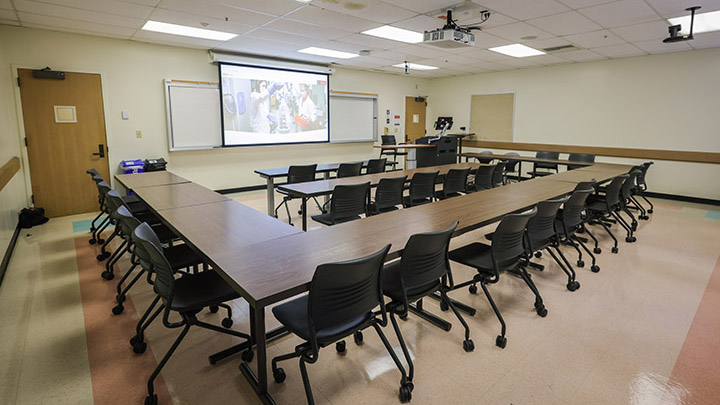 Classroom with podium and projection screen