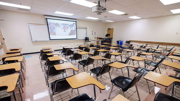 Classroom with podium and projection screen