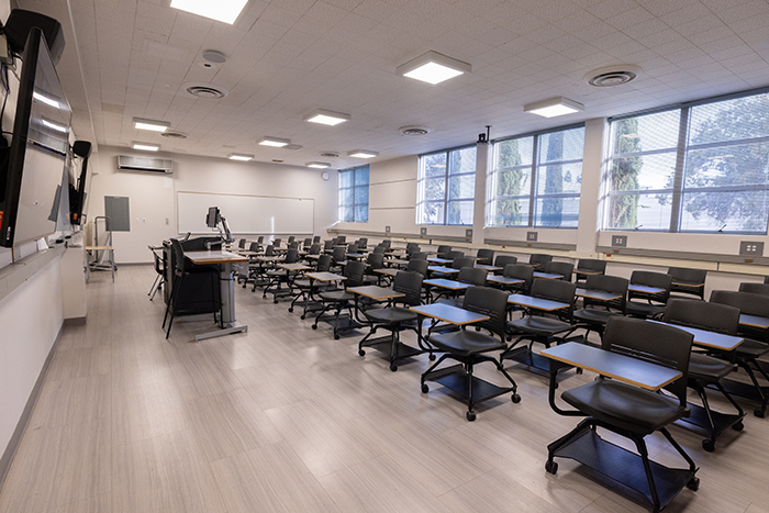 Classroom with a podium and several chairs